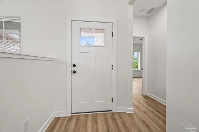a view of bathroom with dual sinks