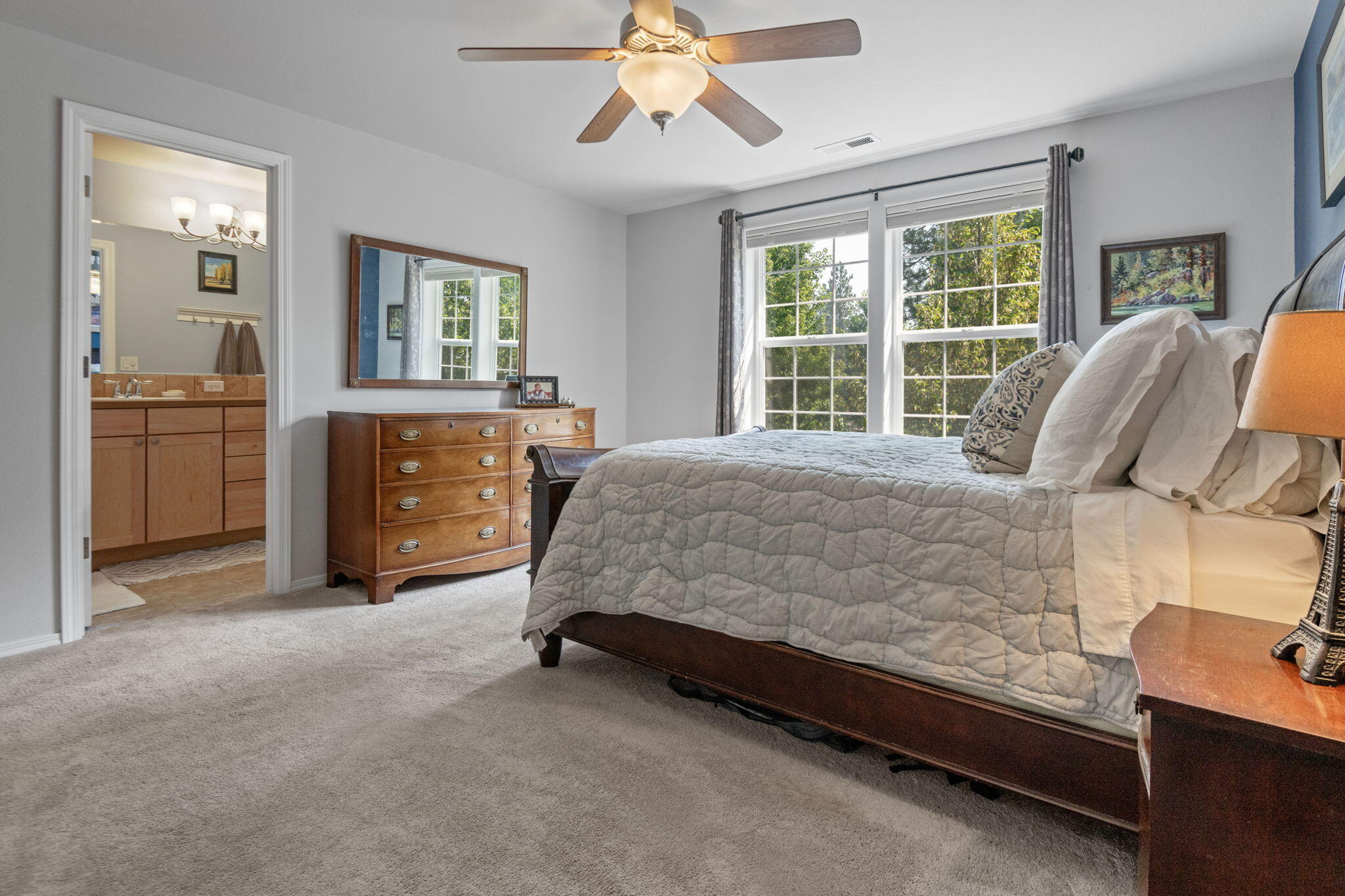 720 North Hindeman Street Sisters, OR 97759 - Photo 9 of 25 a bed room with a bed and a dresser