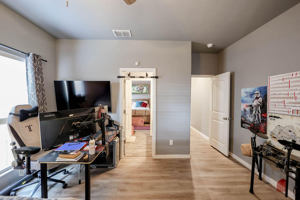 7101 22nd Place Lubbock, TX 79407 - Photo 21 of 24 a view of a room with gym equipment