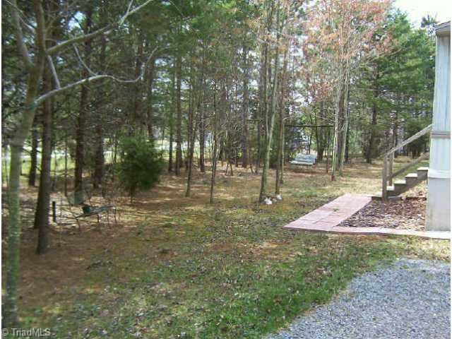 416 Fairground Road East Bend, NC 27018 - Photo 2 of 5 Other. front yard with swing