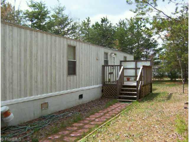 416 Fairground Road East Bend, NC 27018 - Photo 3 of 5 Other. rear of home showing deck