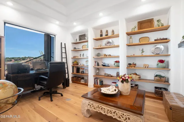 a kitchen with a sink dishwasher and cabinets