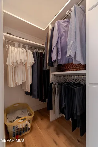 a view of a swimming pool with lounge chair