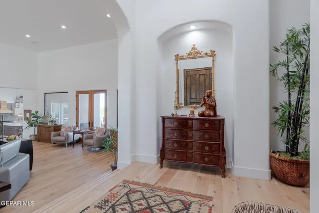 a bedroom with furniture and window