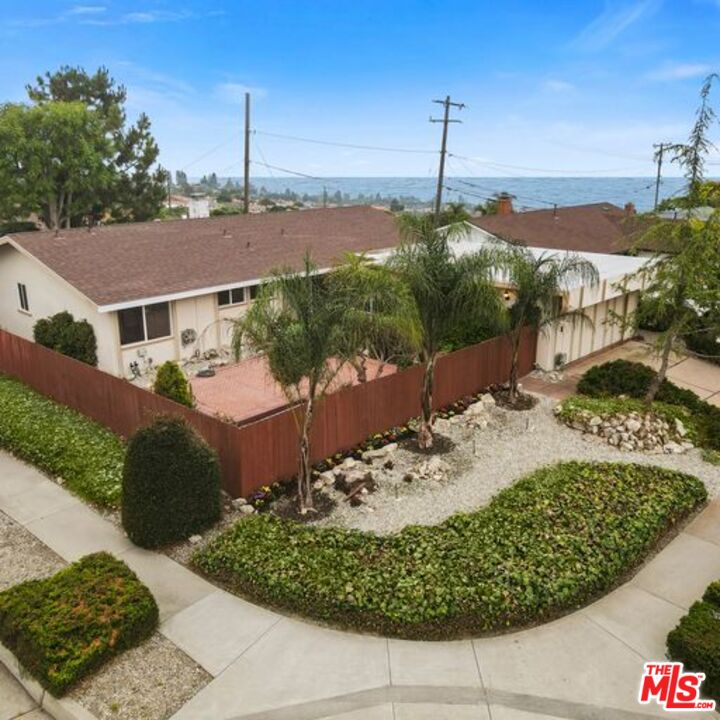 6520 Eddinghill Drive Rancho Palos Verdes, CA 90275 - Photo 1 of 36 a view of a backyard with plants and lake view