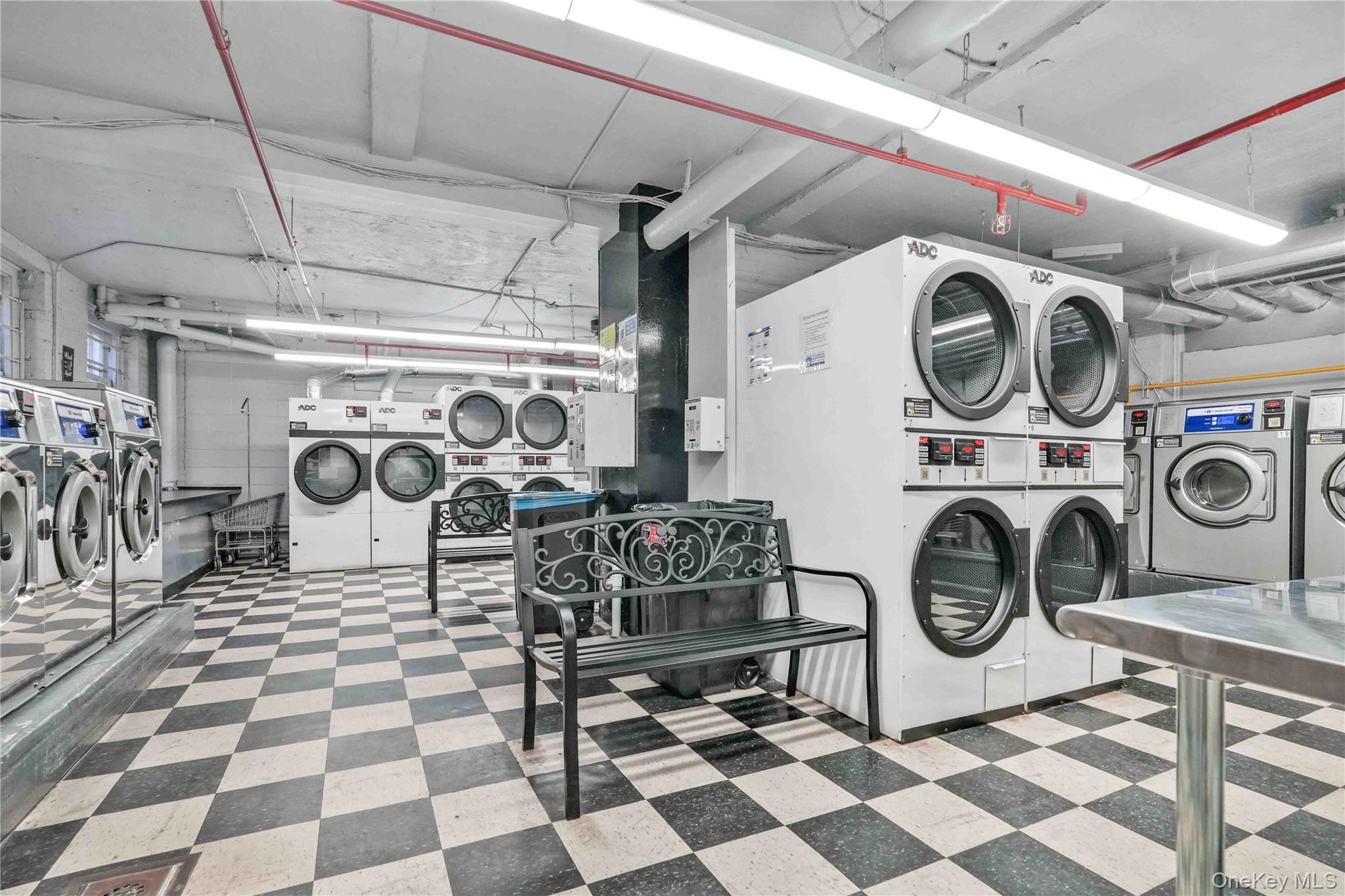 48-50 44th Street, Unit 4E Queens, NY 11377 - Photo 11 of 13 a view of a storage and utility room with stainless steel appliances