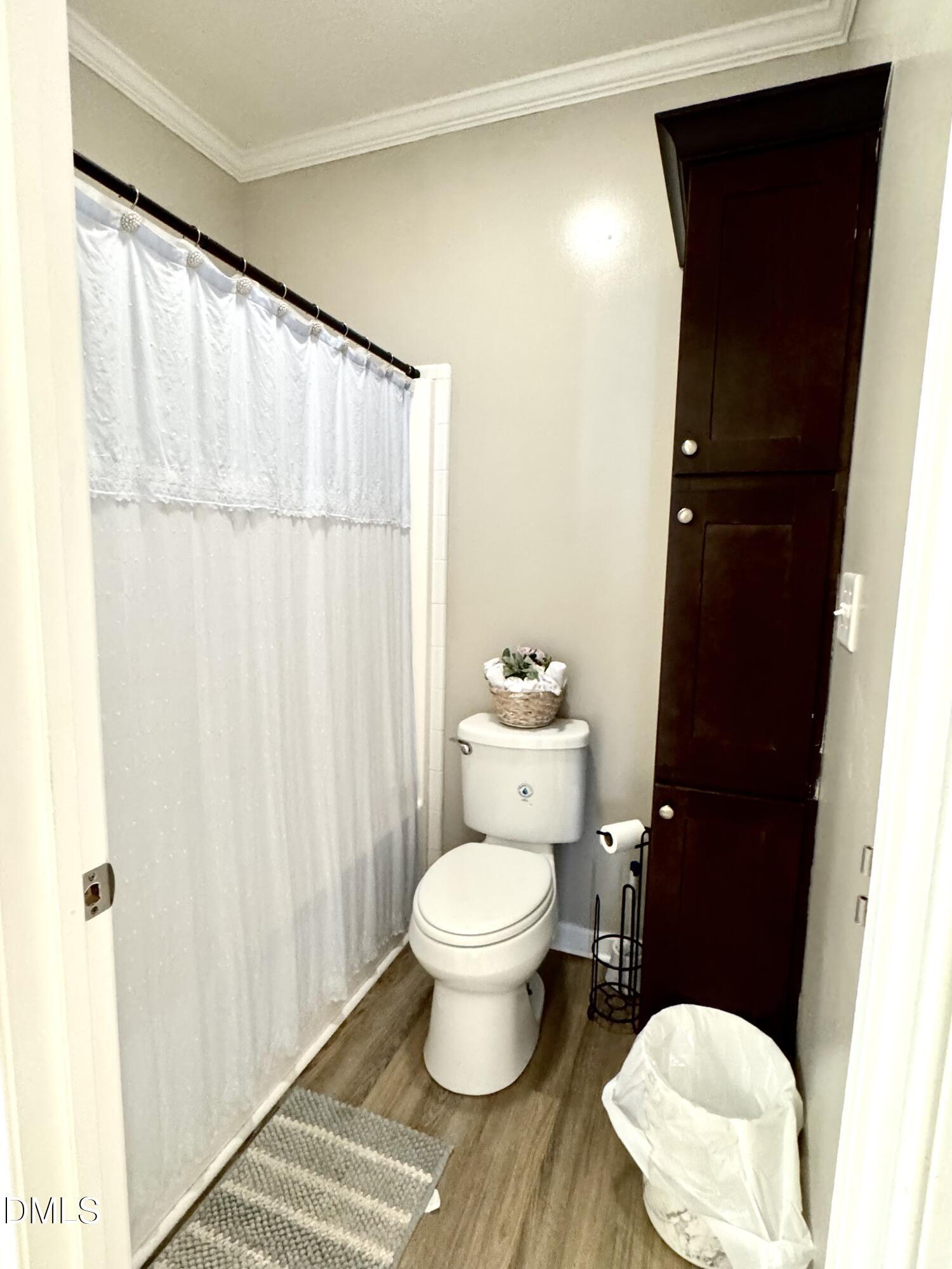 640 Tart Town Road Dunn, NC 28334 - Photo 28 of 71 a bathroom with a toilet and a sink