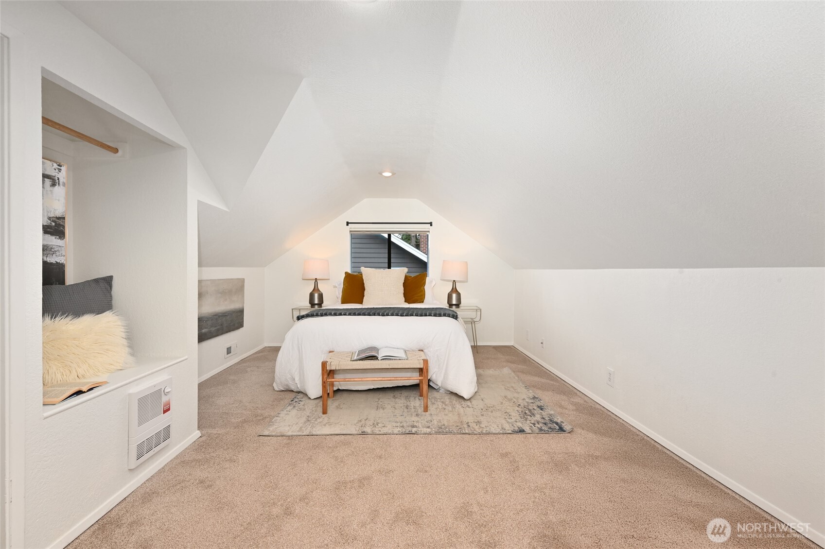 6056 25th Avenue Northeast Seattle, WA 98115 - Photo 21 of 34 a bedroom with a bed and a large window