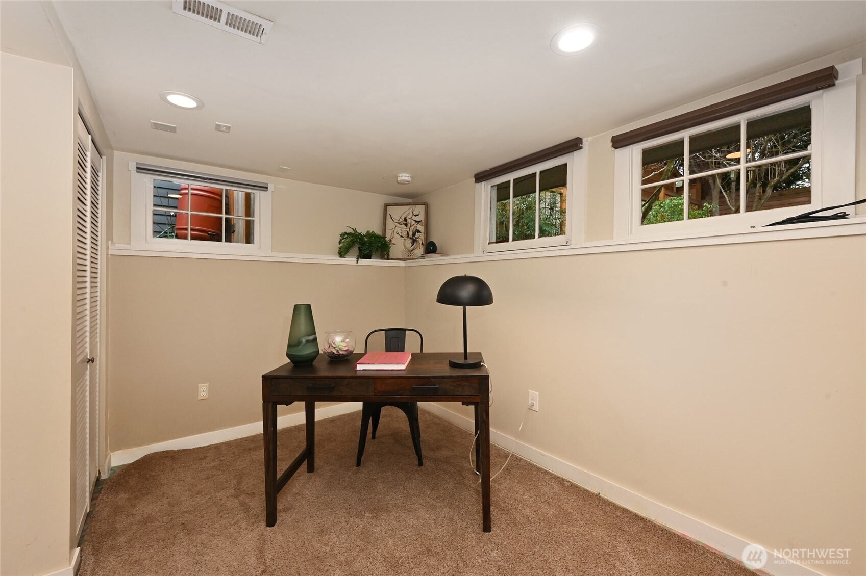 6056 25th Avenue Northeast Seattle, WA 98115 - Photo 24 of 34 a view of a workspace with furniture