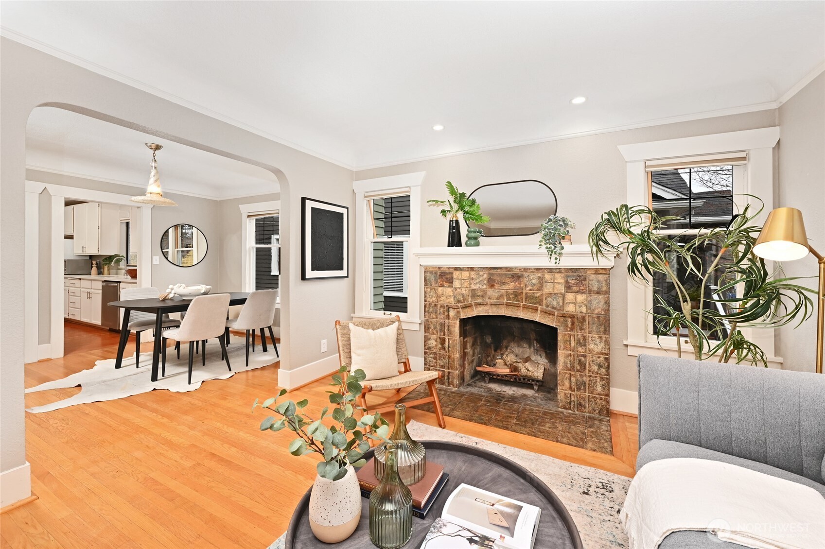 6056 25th Avenue Northeast Seattle, WA 98115 - Photo 7 of 34 a living room with furniture and a fireplace