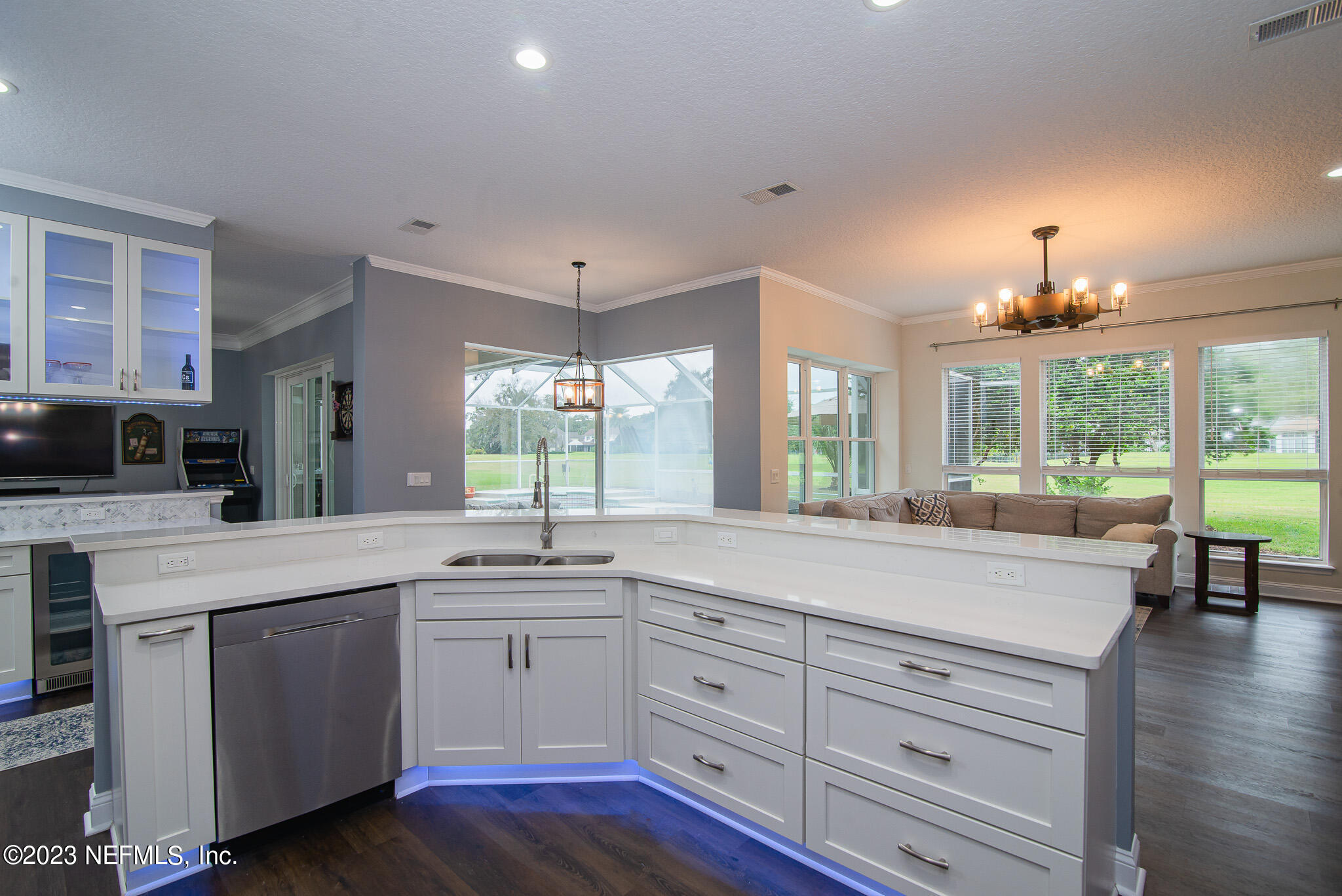 780 Queens Harbor Boulevard Jacksonville, FL 32225 - Photo 18 of 42 a kitchen with a sink stove and cabinets