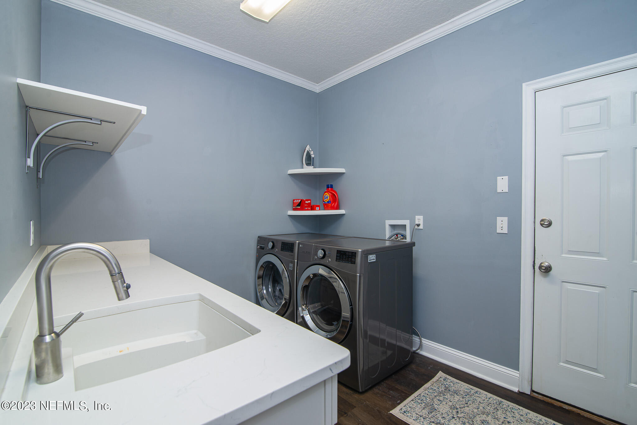 780 Queens Harbor Boulevard Jacksonville, FL 32225 - Photo 25 of 42 a utility room with dryer and washer