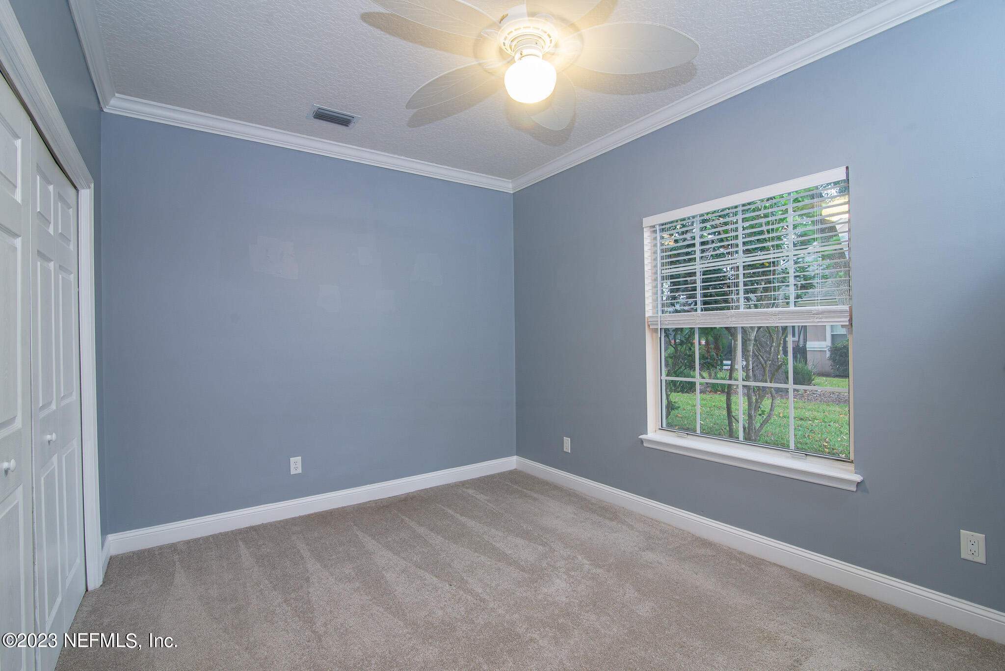 780 Queens Harbor Boulevard Jacksonville, FL 32225 - Photo 26 of 42 an empty room with a window