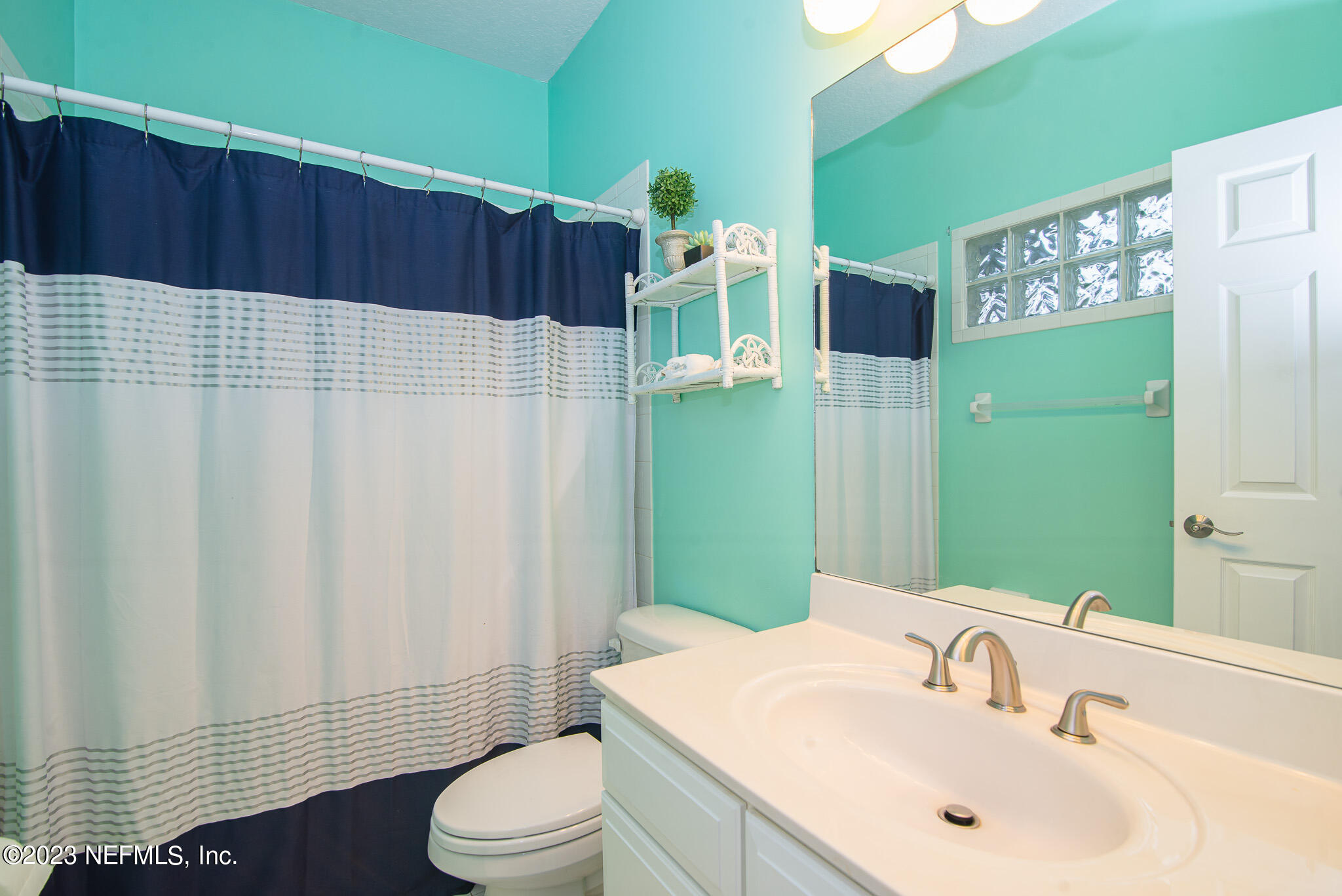 780 Queens Harbor Boulevard Jacksonville, FL 32225 - Photo 27 of 42 a bathroom with a sink toilet and shower