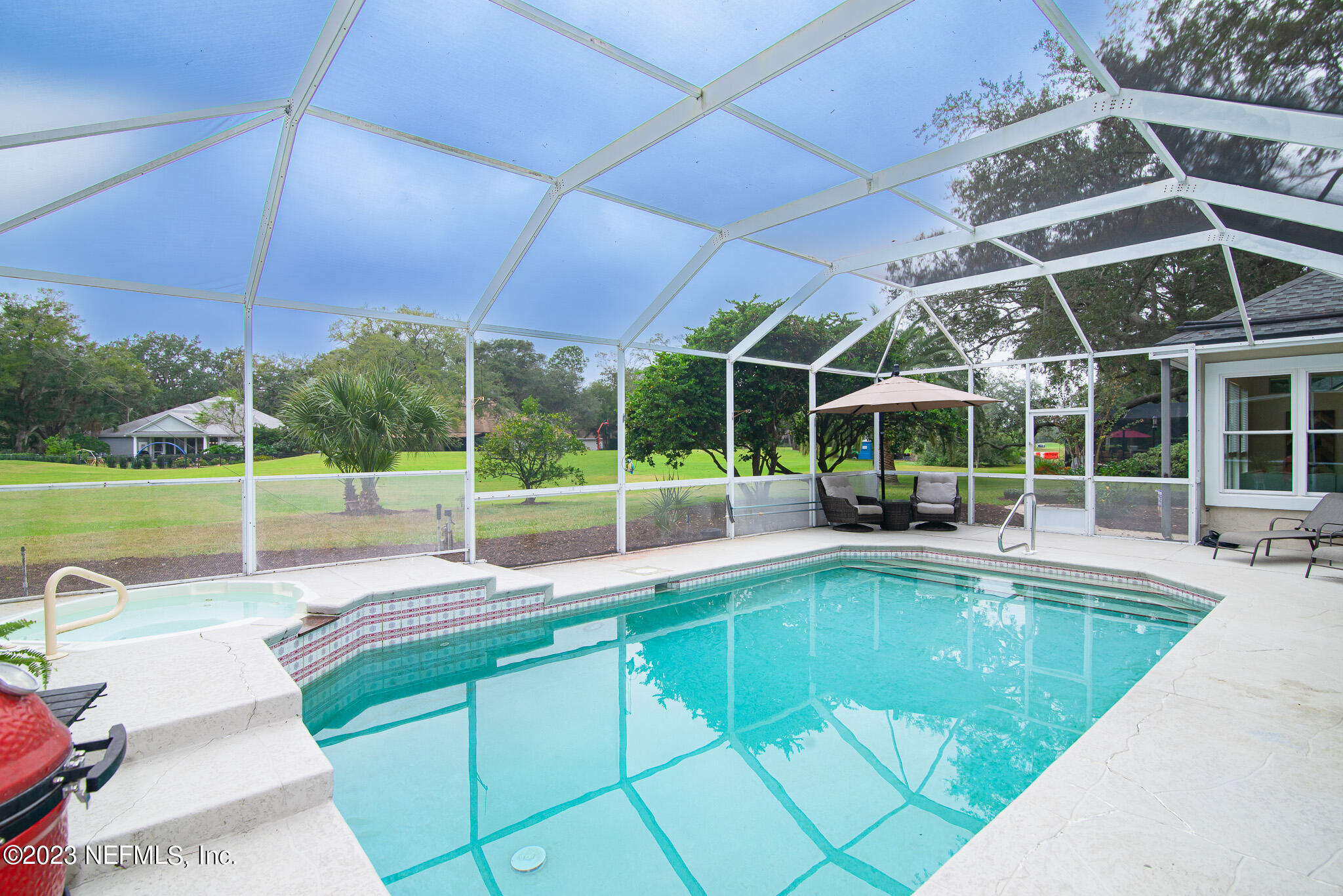 780 Queens Harbor Boulevard Jacksonville, FL 32225 - Photo 31 of 42 a view of a house with a backyard porch and sitting area