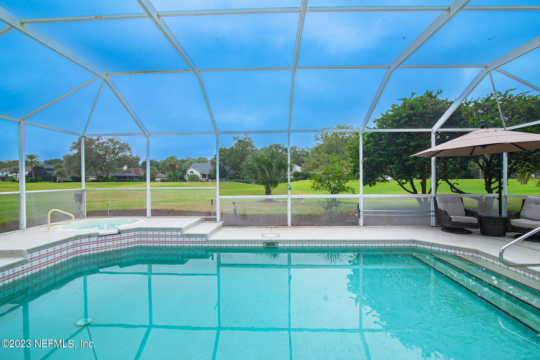 780 Queens Harbor Boulevard Jacksonville, FL 32225 - Photo 33 of 42 a view of a backyard with sitting area and tub