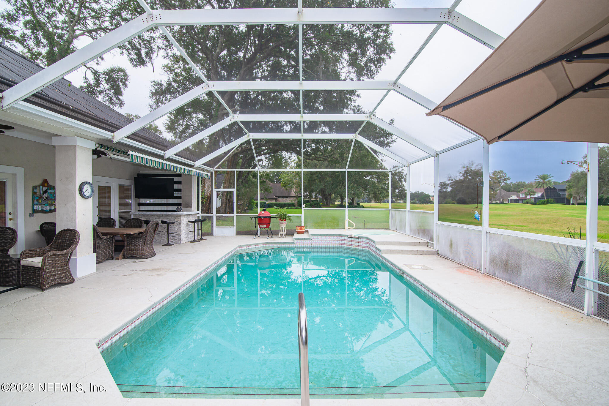 780 Queens Harbor Boulevard Jacksonville, FL 32225 - Photo 36 of 42 a view of a swimming pool with a patio