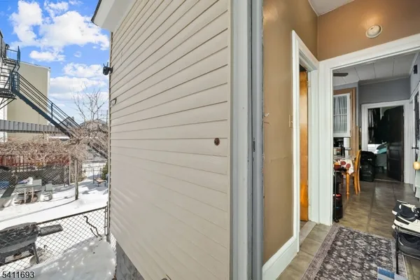 a view of a balcony and a yard