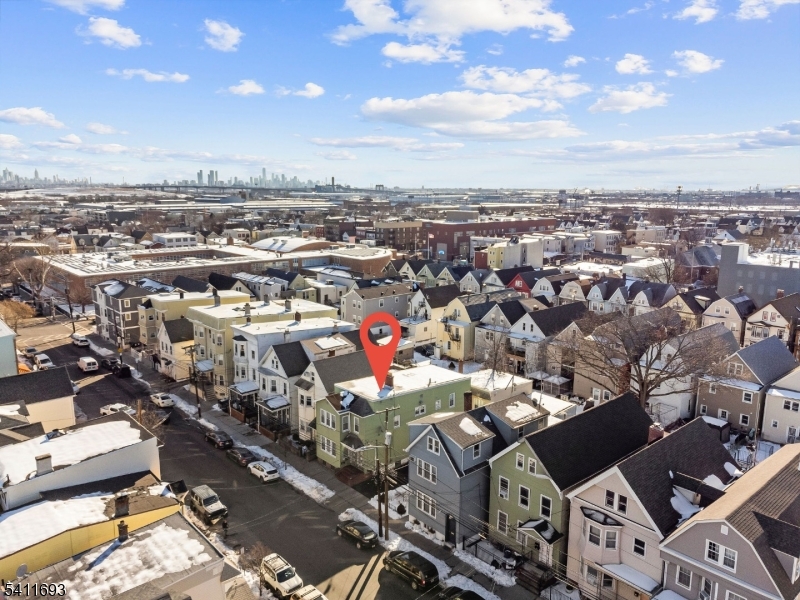 419 Hamilton Street Harrison, NJ 07029 - Photo 4 of 42 an aerial view of a city