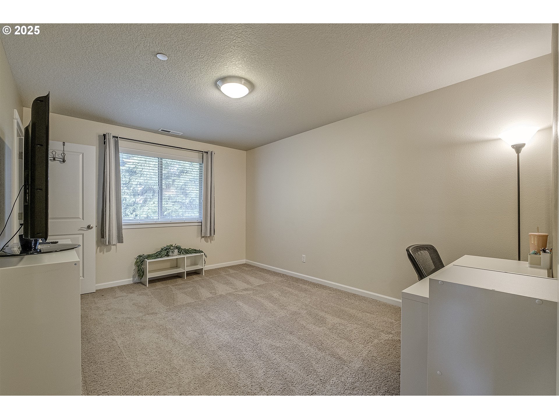 22831 Southwest Park Row Sherwood, OR 97140 - Photo 19 of 33 a view of a livingroom with furniture and a window