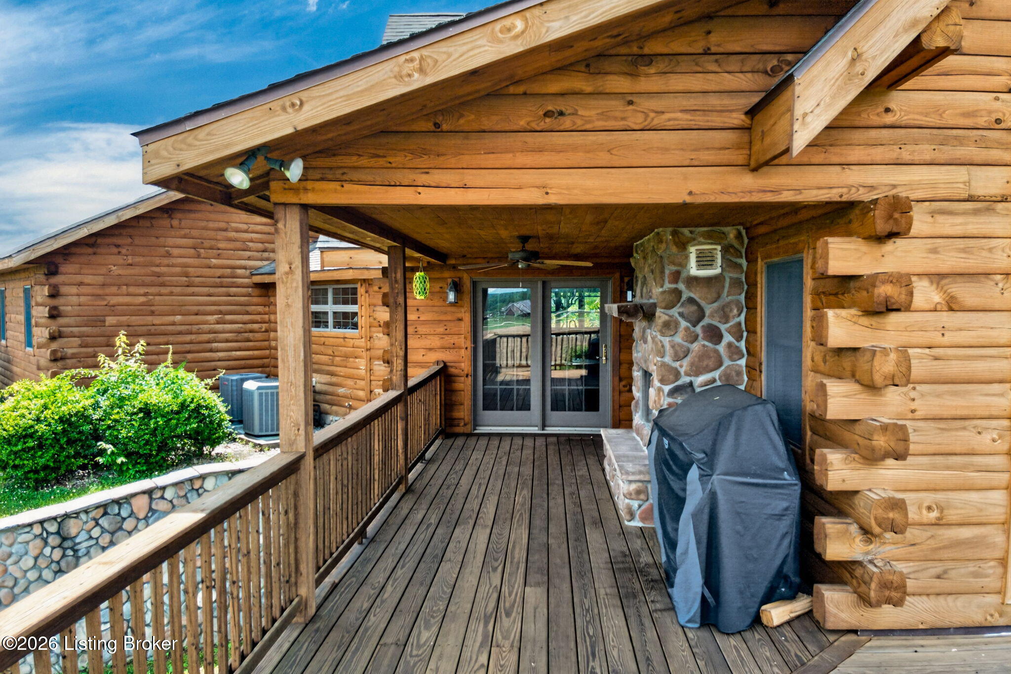 771 Mud Splash Road Elizabethtown, KY 42701 - Photo 68 of 85 An atrium door in the dining room opens to the wraparound side porch, which features a fireplace, ceiling fan, and sweeping views of the property