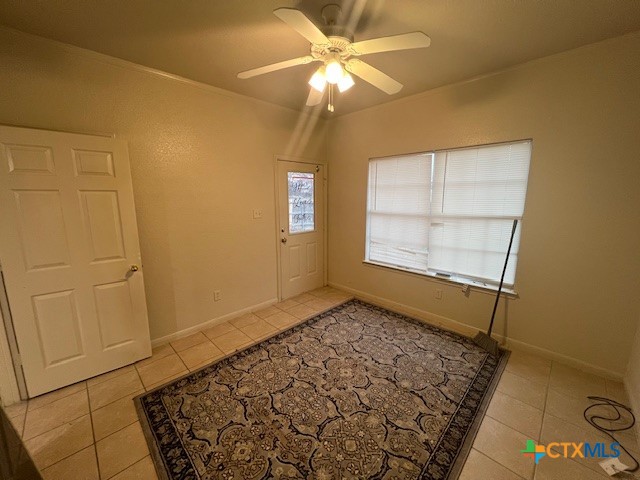 5806 Hamza Circle Killeen, TX 76542 - Photo 7 of 17 an empty room with windows and fan