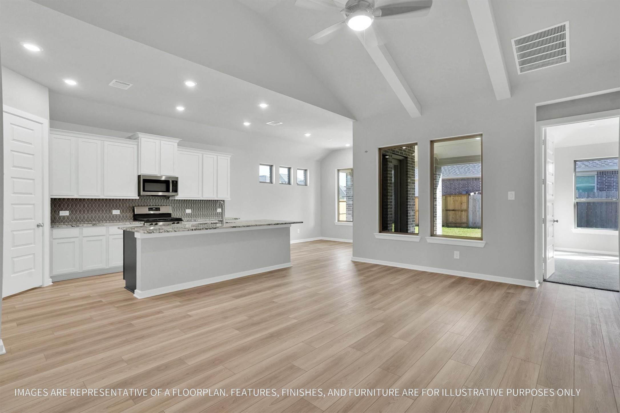 719 Mockingbird Psge Drive Beasley, TX 77417 - Photo 16 of 32 a view of kitchen with granite countertop cabinets and refrigerator