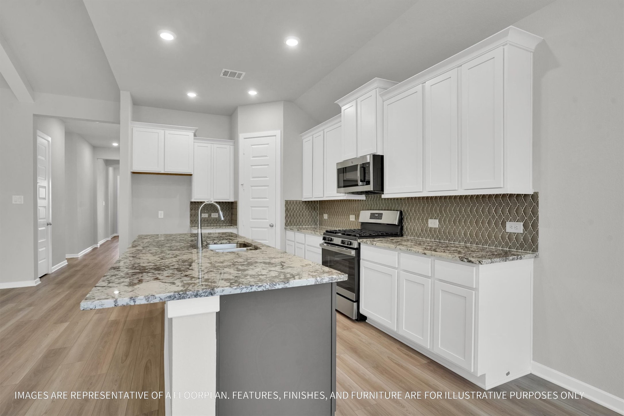 719 Mockingbird Psge Drive Beasley, TX 77417 - Photo 20 of 32 a kitchen with stainless steel appliances granite countertop a sink stove and refrigerator