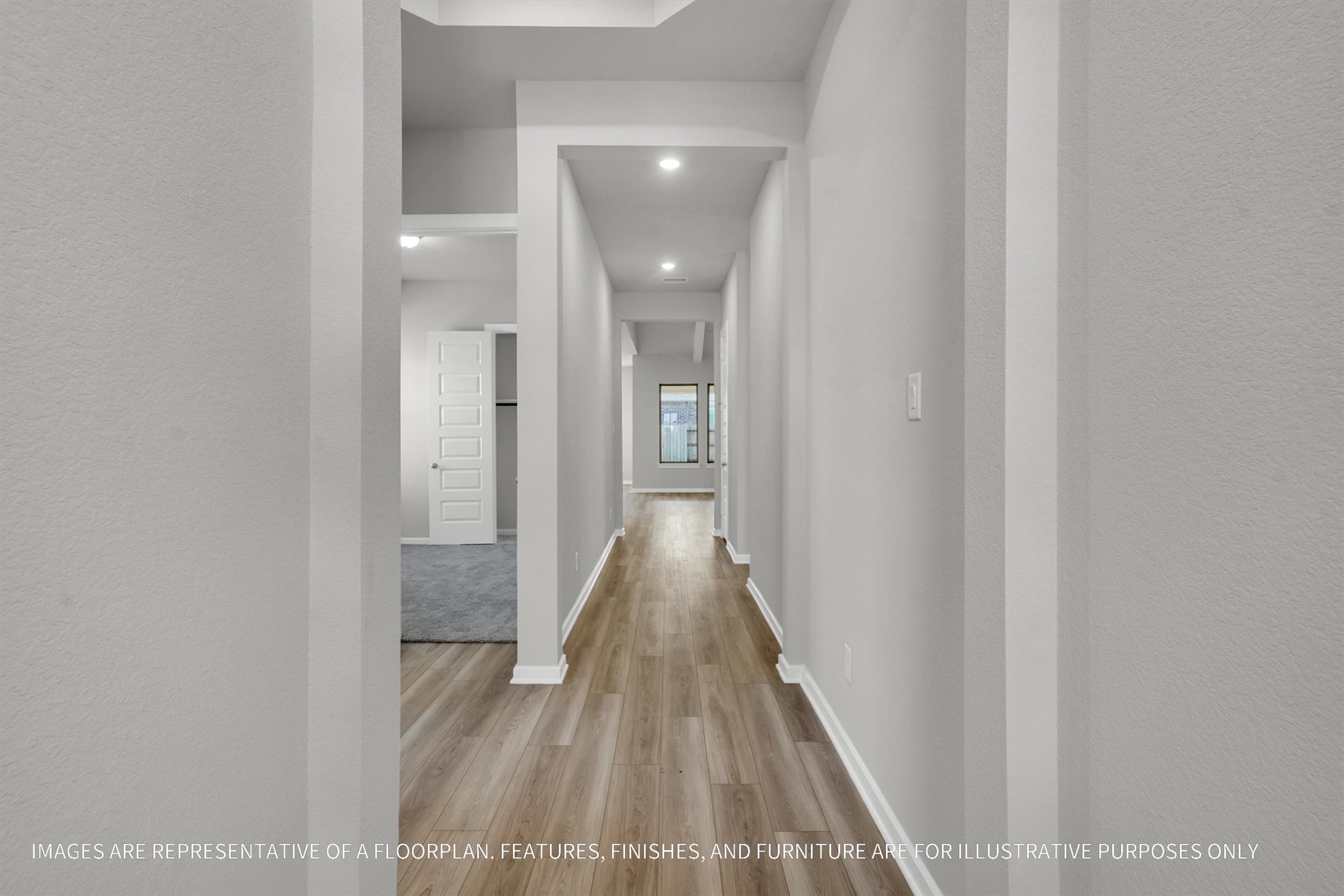 719 Mockingbird Psge Drive Beasley, TX 77417 - Photo 5 of 32 a view of a hallway with wooden floor
