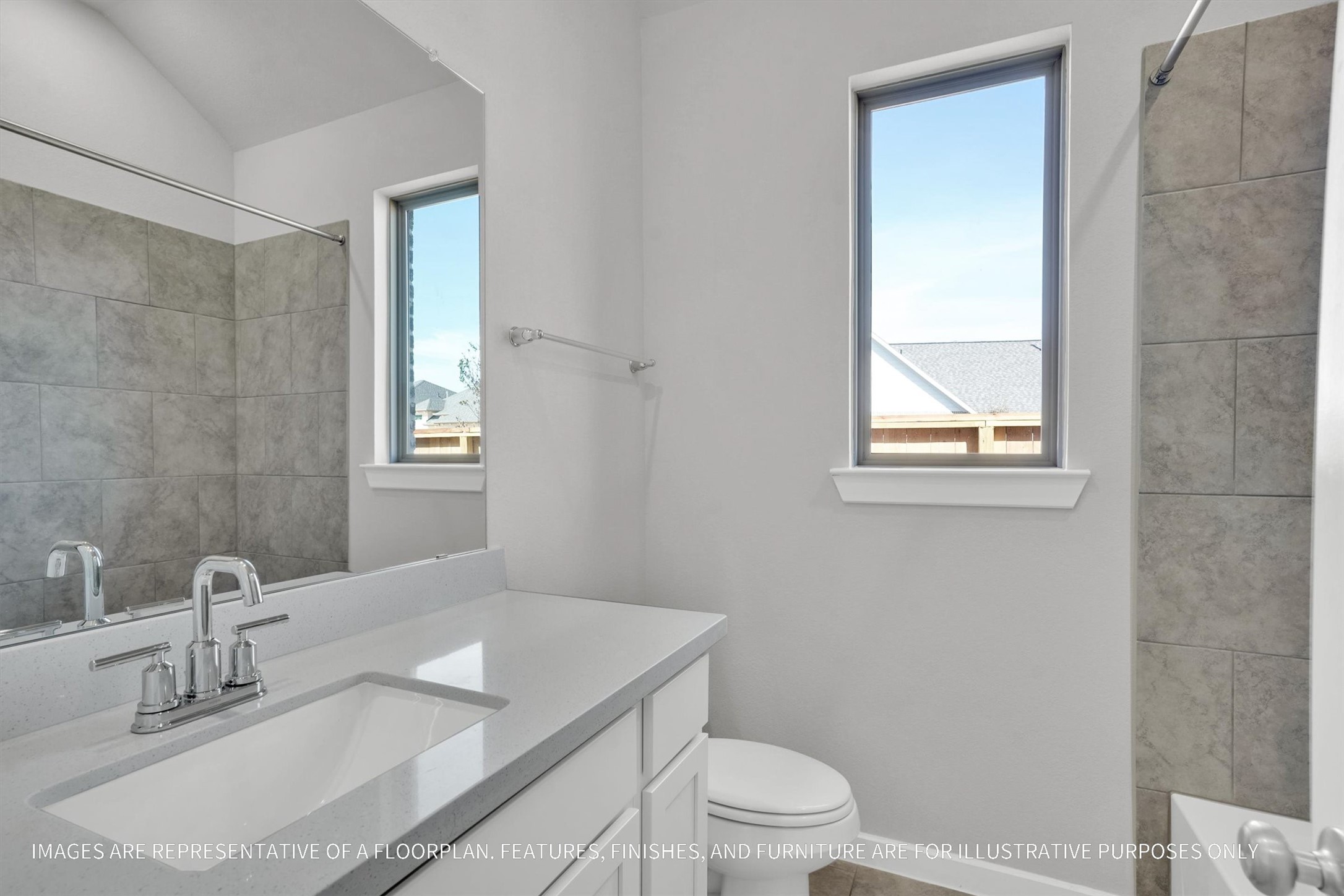 719 Mockingbird Psge Drive Beasley, TX 77417 - Photo 10 of 32 a bathroom with a granite countertop sink a toilet and a mirror