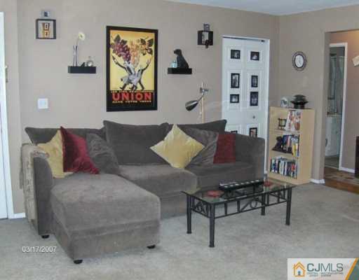 400 Cross Road Matawan, NJ 07747 - Photo 4 of 4 a living room with furniture and a couch