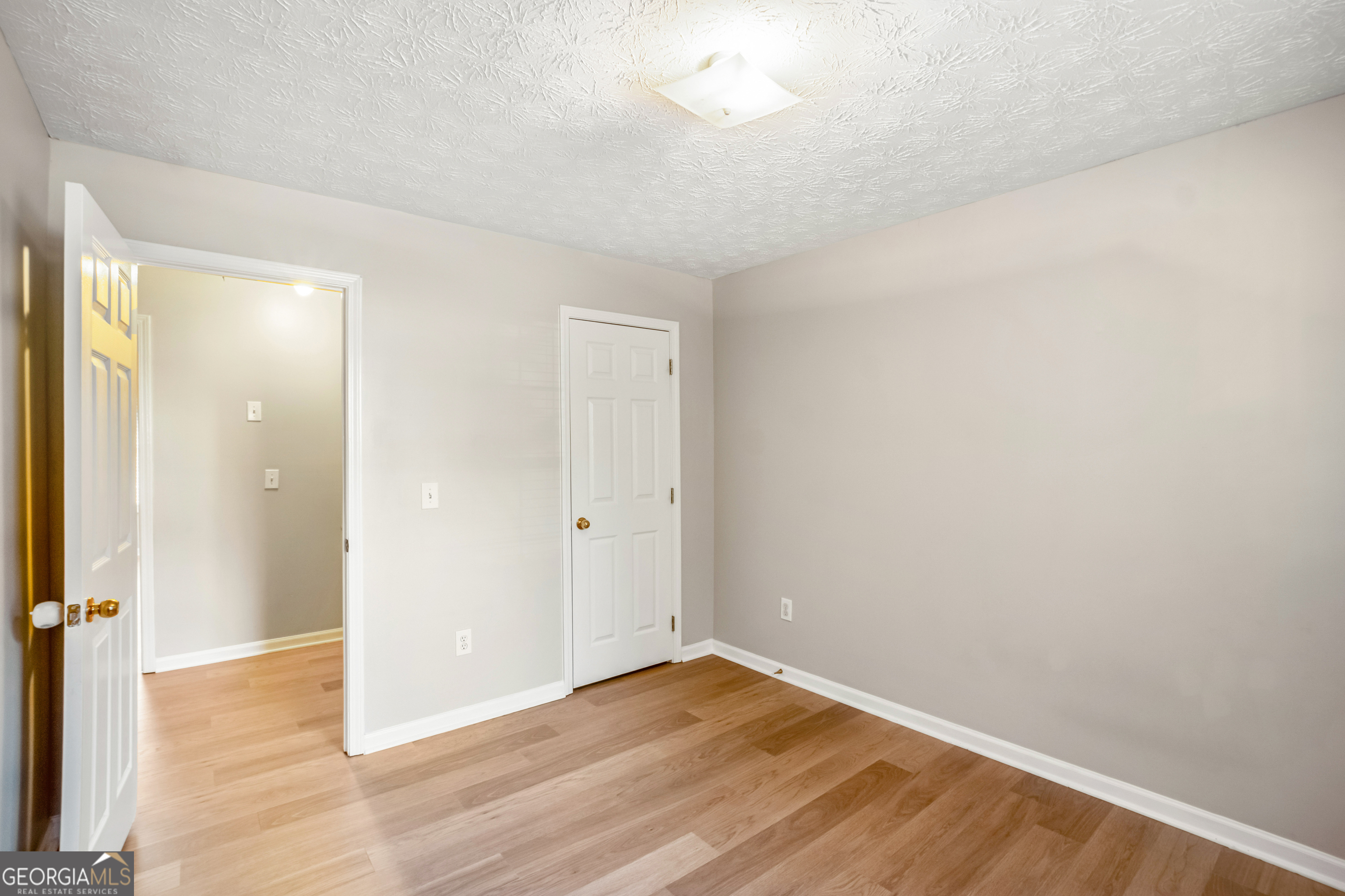 953 Azalea Court Winder, GA 30680 - Photo 17 of 56 wooden floor in an empty room