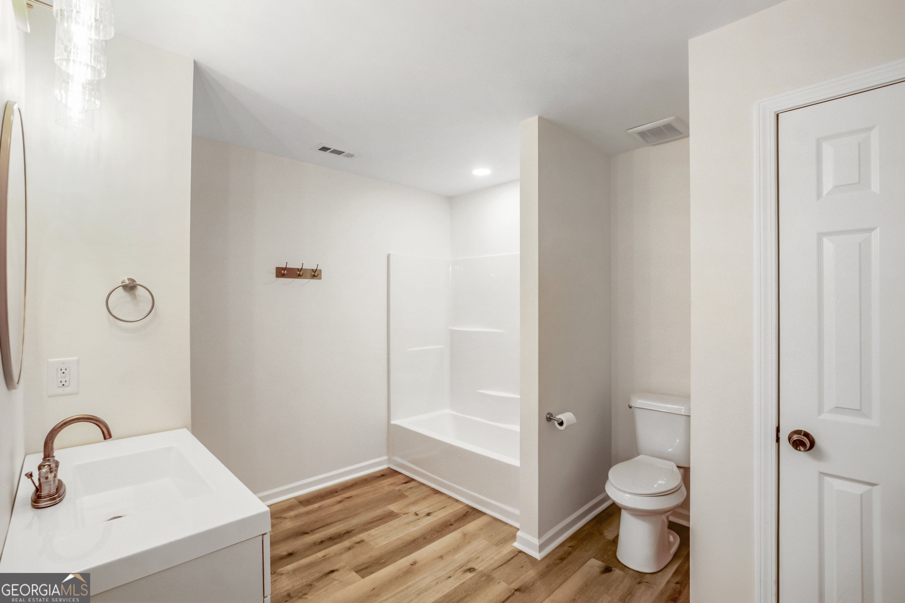 953 Azalea Court Winder, GA 30680 - Photo 35 of 56 a bathroom with a sink toilet and shower