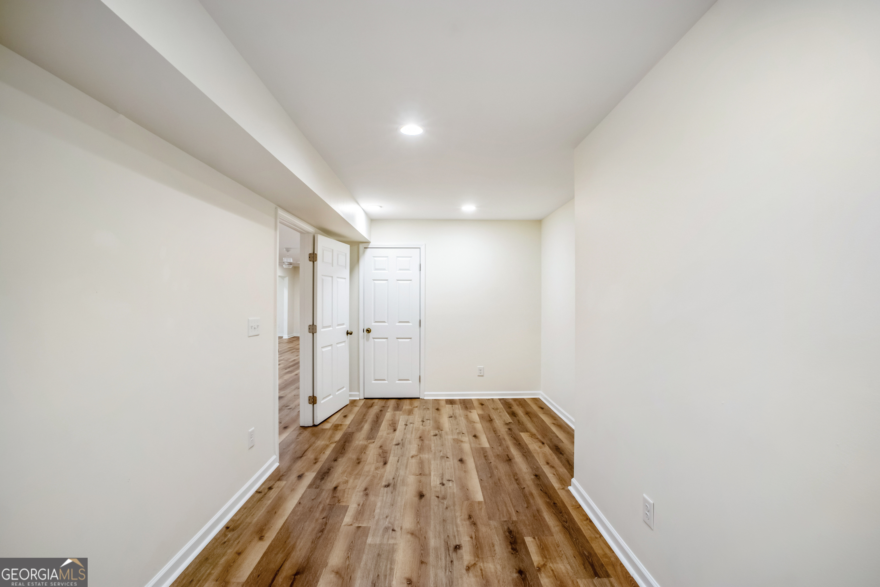 953 Azalea Court Winder, GA 30680 - Photo 38 of 56 a view of a room with wooden floor and bathroom