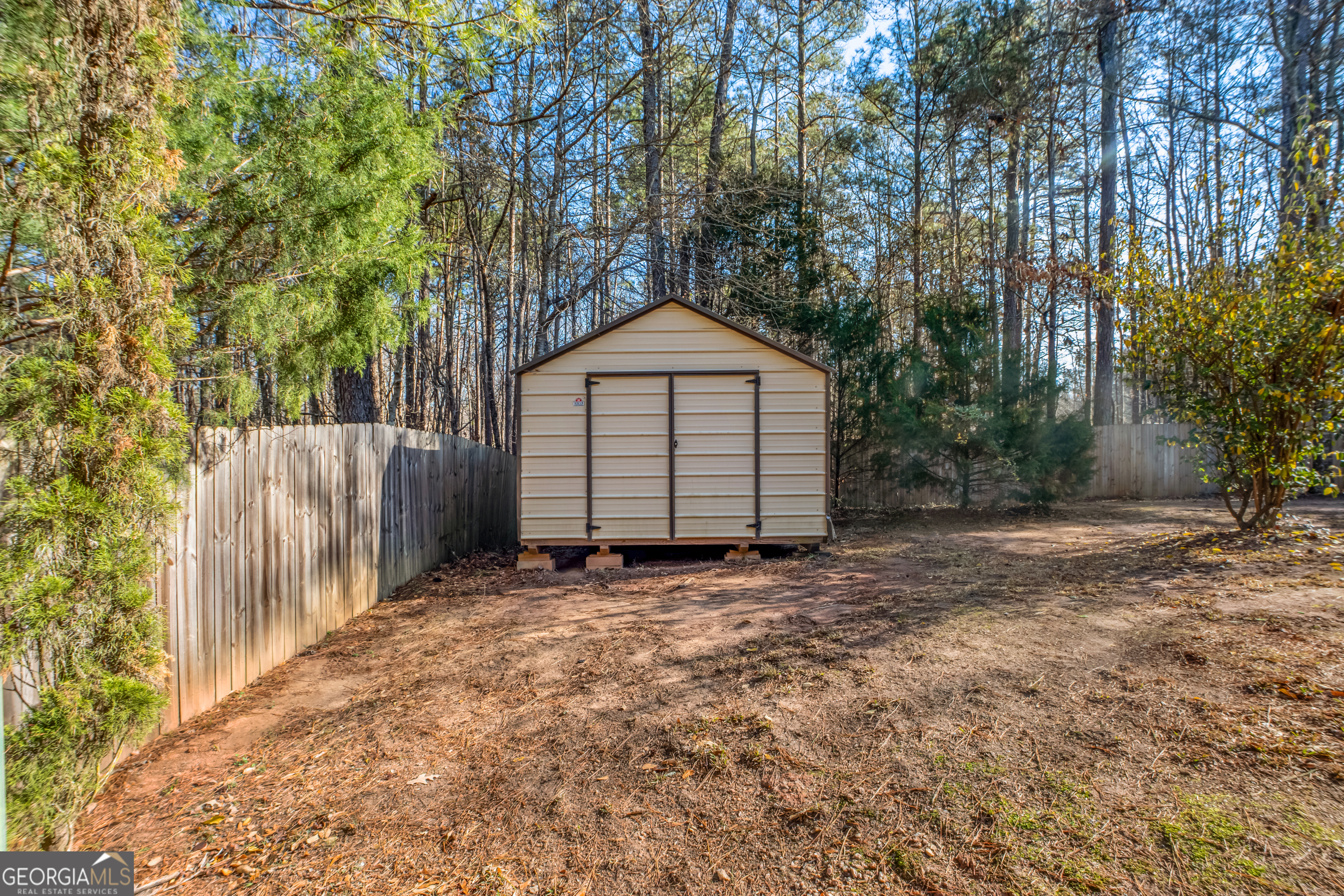 953 Azalea Court Winder, GA 30680 - Photo 44 of 56 a front view of a house with a yard and garage