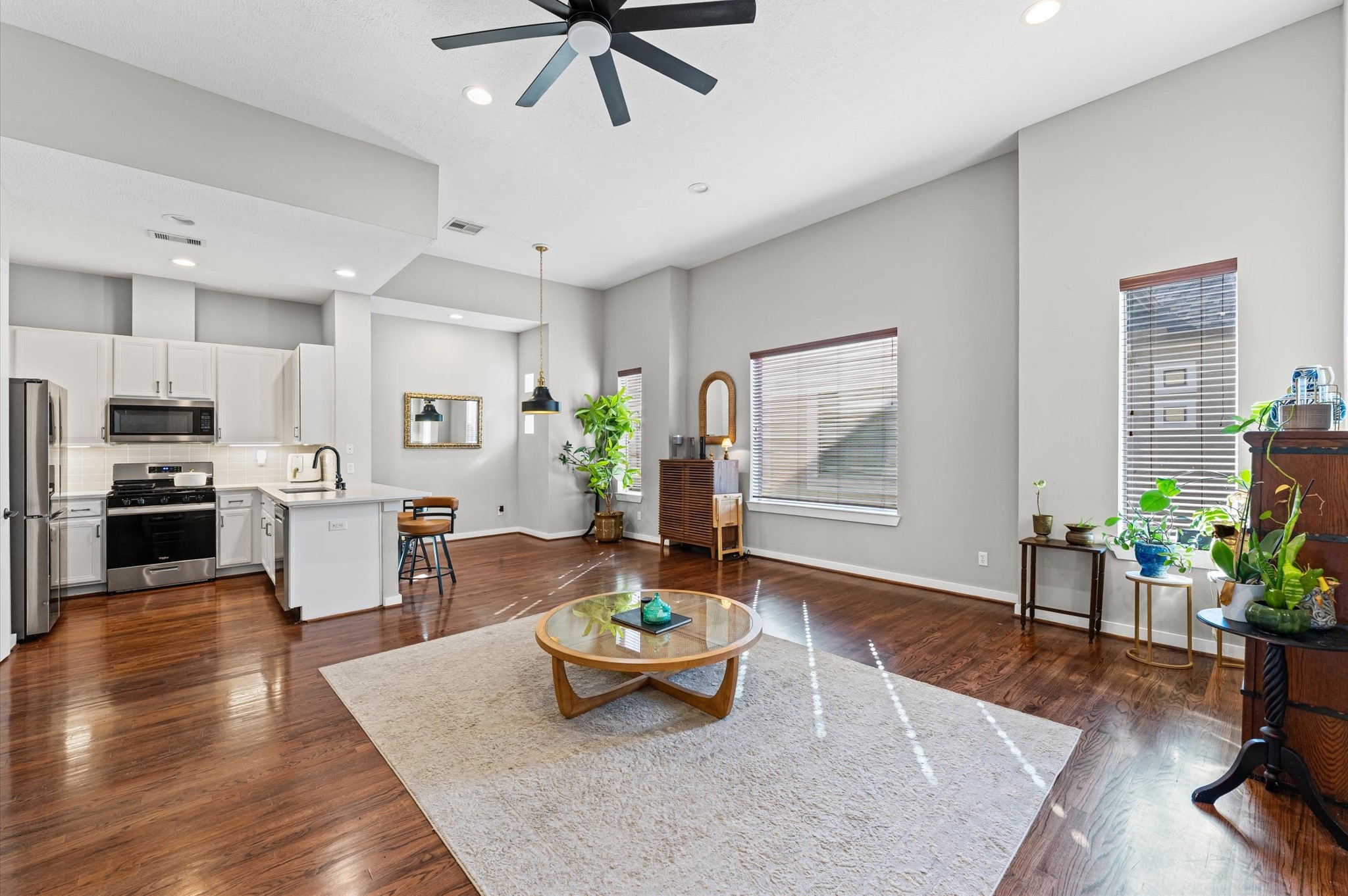 1166 Bonner Street Houston, TX 77007 - Photo 11 of 33 a living room with furniture and a wooden floor