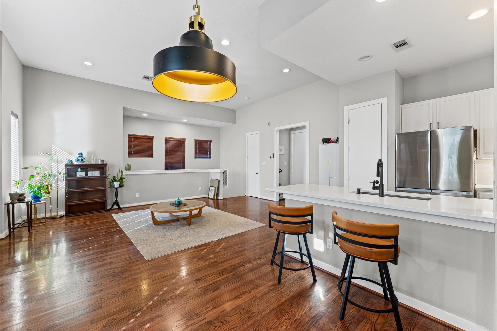 1166 Bonner Street Houston, TX 77007 - Photo 12 of 33 a living room with dining room and wooden floor