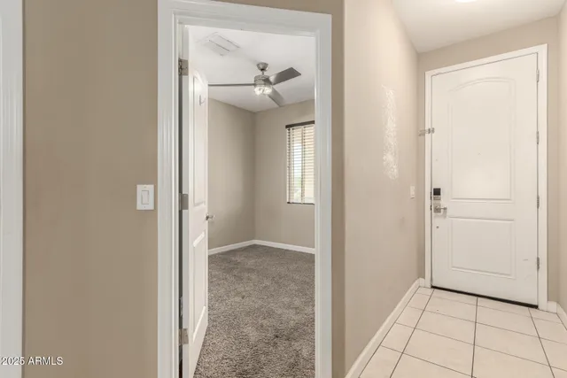 an empty room that has a mirror