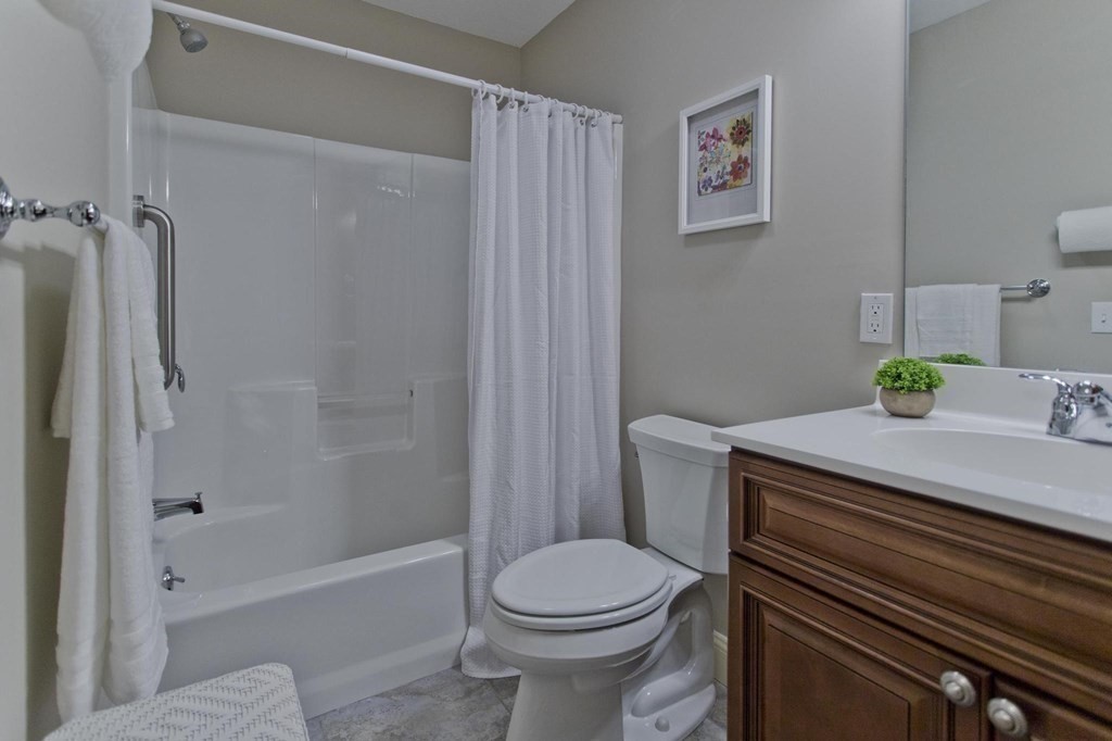 73 Beech Hill Road, Unit 73 West Springfield, MA 01089 - Photo 13 of 29 a bathroom with a sink a toilet and shower