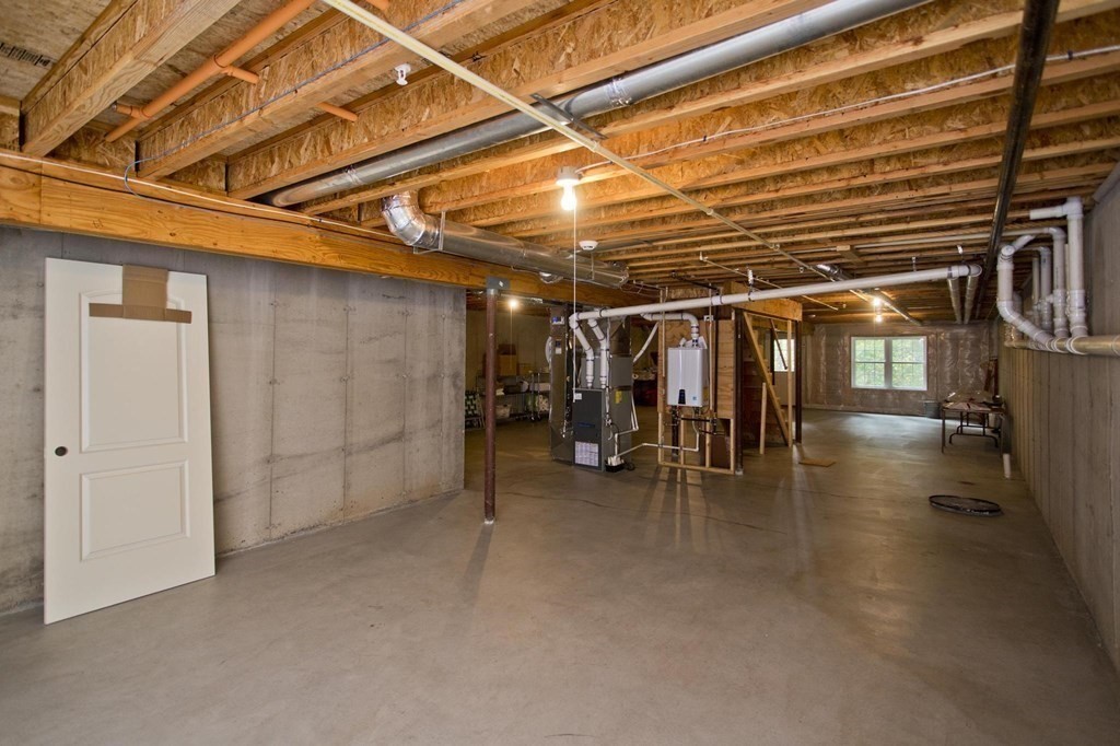 73 Beech Hill Road, Unit 73 West Springfield, MA 01089 - Photo 26 of 29 a view of empty room with wooden walls
