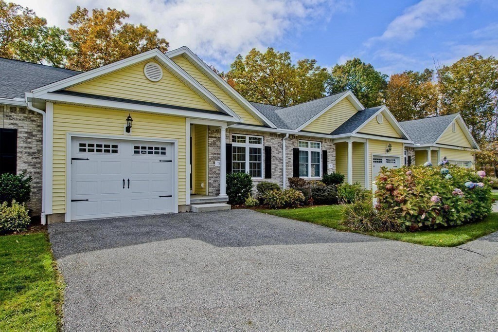 73 Beech Hill Road, Unit 73 West Springfield, MA 01089 - Photo 29 of 29 front view of a house with a yard