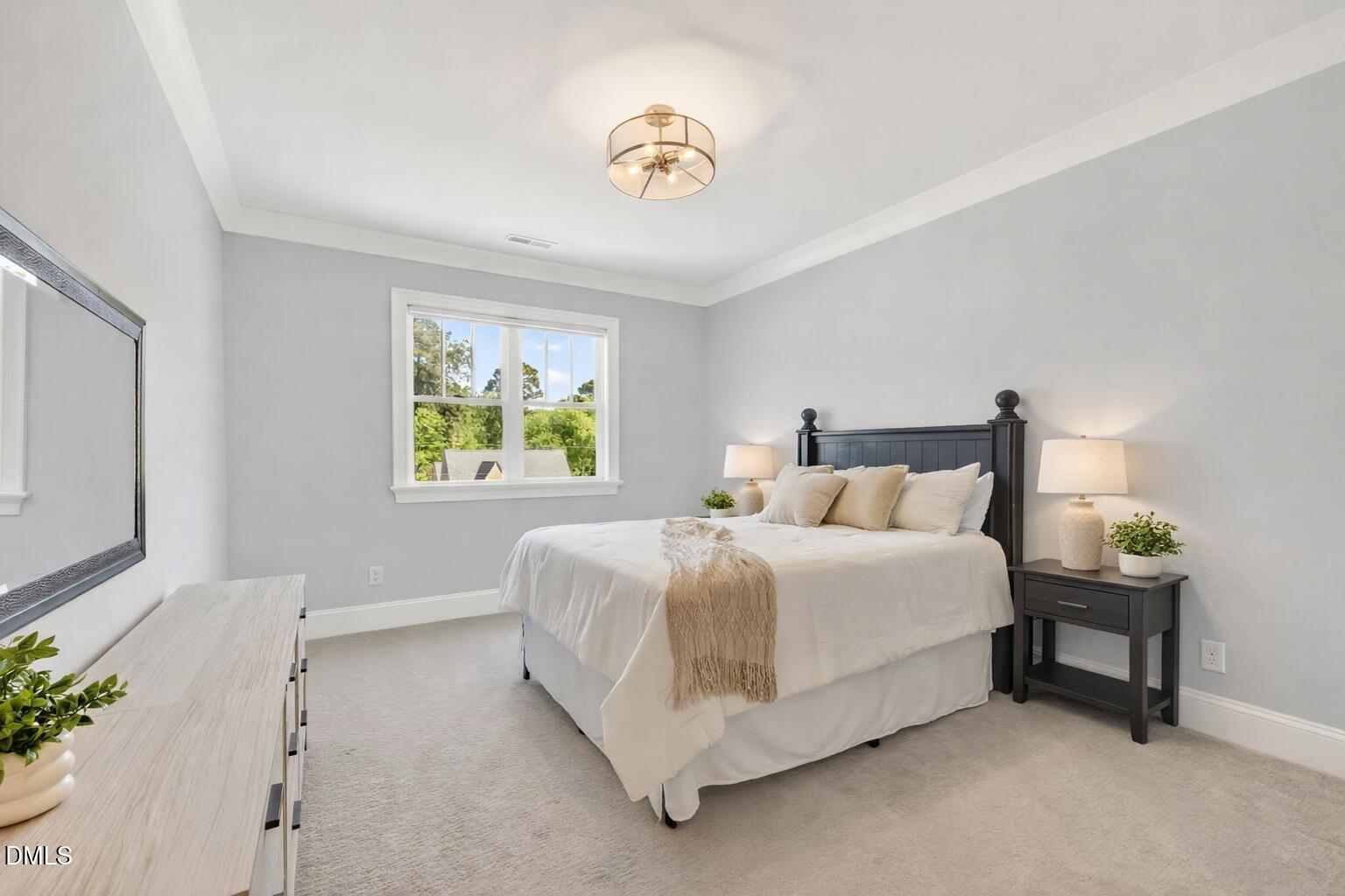 3419 Edgemont Drive Raleigh, NC 27612 - Photo 32 of 41 Serene bedroom with green accents