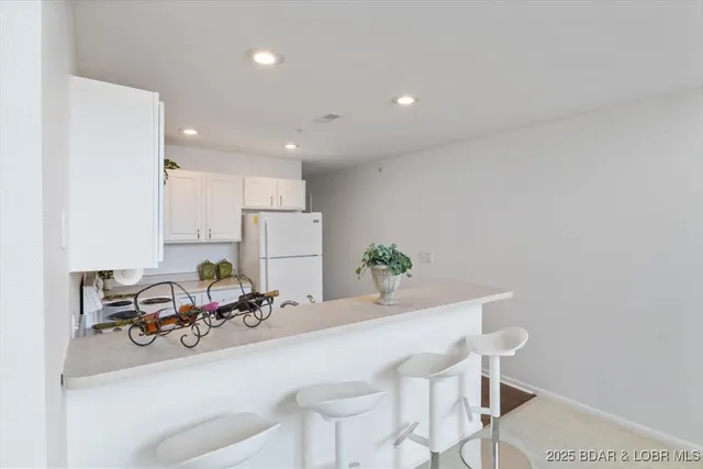 $335,000 | 521 Park Pl Drive, Unit 4E, Kaiser, MO 65047