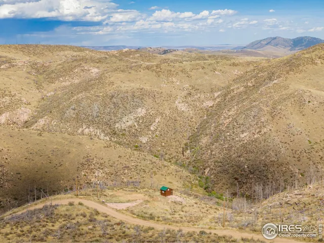 a view of a backyard of a house