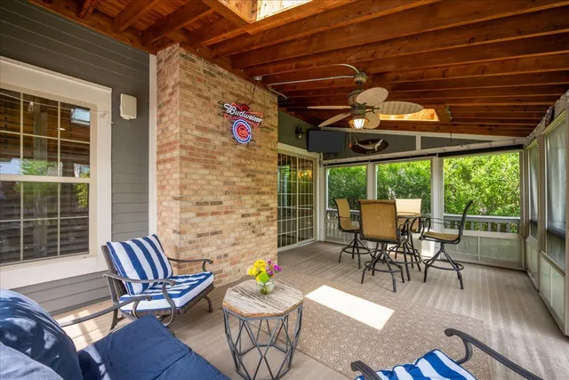 a patio with table and chairs