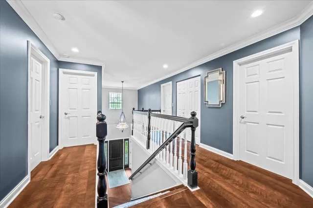 a view of a hallway with an entryway