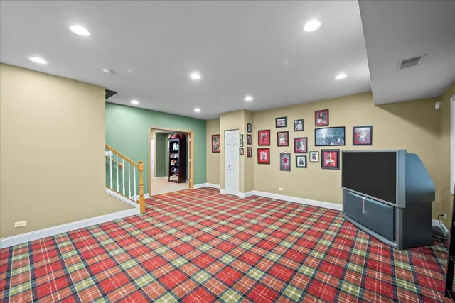 a bedroom with a bed and cabinets