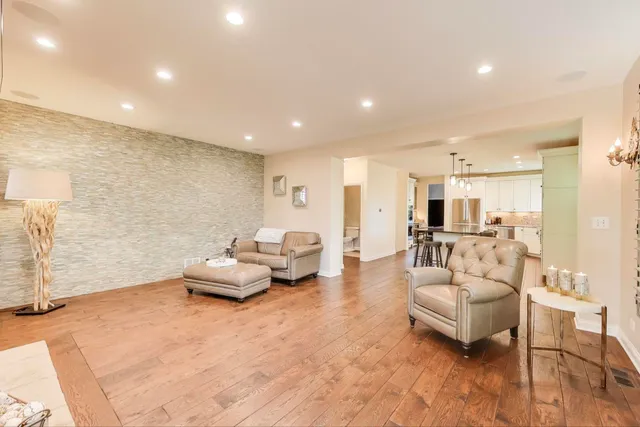 a living room with furniture and a table