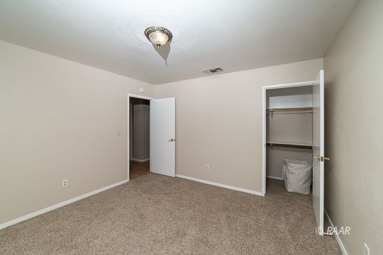 1104 Argus Street Ridgecrest, CA 93555 - Photo 10 of 25 a view of an empty room with a window