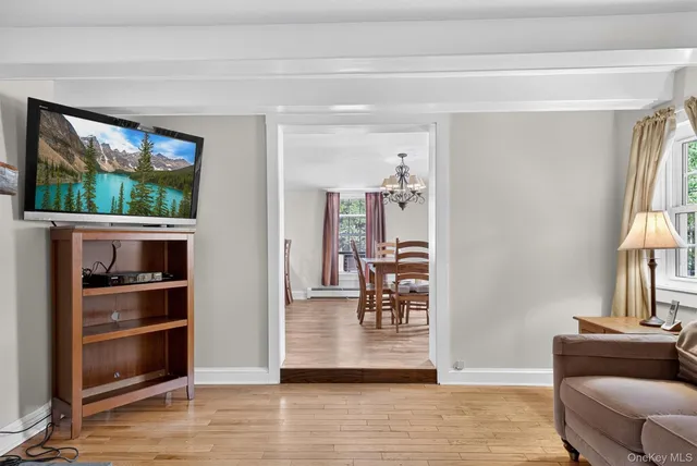a view of a livingroom with furniture and windows
